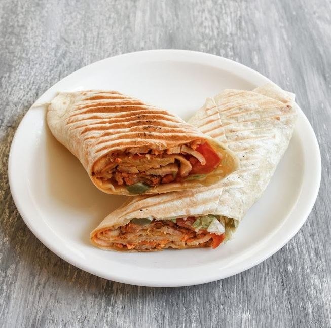 Delicious döner wraps cut in half showing the filling